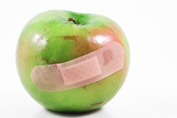bruised-apple-with-plaster-over